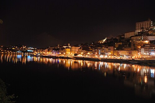 Ribeira waterfront reflected in the Douro